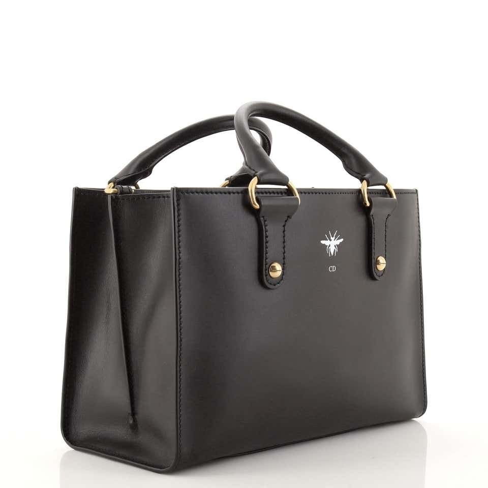 CHRISTIAN DIOR D-BEE 2-WAY BAG *AUTHENTIC* (Category: Luxury Bags & Wallets) located in Iloilo. Submitted by primefinds (Listing ID 1262282967, Image 2). Description: CHRISTIAN DIOR D-BEE 2-WAY BAG GHW BLACK CONDITION: 9.5/10 INCLUSIONS: Dustbag and strap Serial: 01-RU-0xxx On clearance sale. No more haggling please. Payment options: ***Pay only 50% and full balance via LBC Cod ***Layaway up to 3 months, deposit only 30%, no interest..
