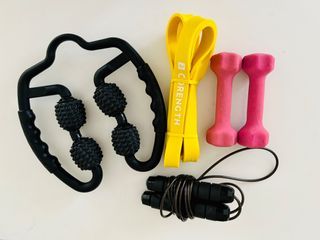Decathalon resistance band, 2lb dumbbells, yoga mat, skipping rope, massager