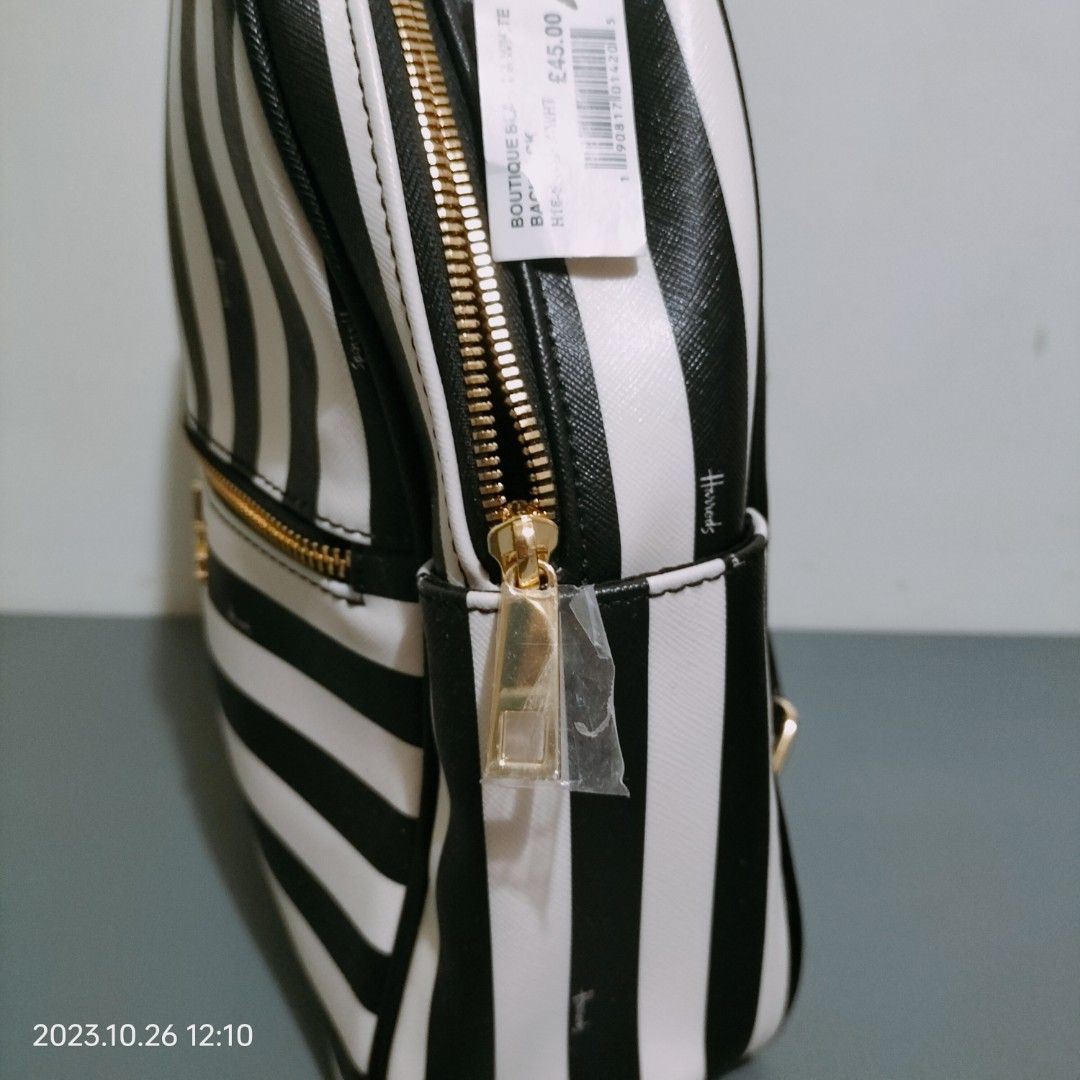 Harrods (Category: Backpacks) located in Baguio. Submitted by livewless (Listing ID 1262183331, Image 3). Description: Harrods black and white small back pack. Brand new. with front/side pockets. 3 inside pockets. fabric-lined. Payment first via Gcash or BDO. #everyonewins.