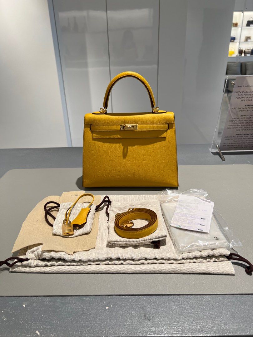 Look no further than this authentic Hermès 25 cm Lime Yellow Epsom