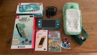 Nintendo Switch Lite Turquoise w/ Animal Crossing Carrying Bag & Animal Crossing Physical Game‼️