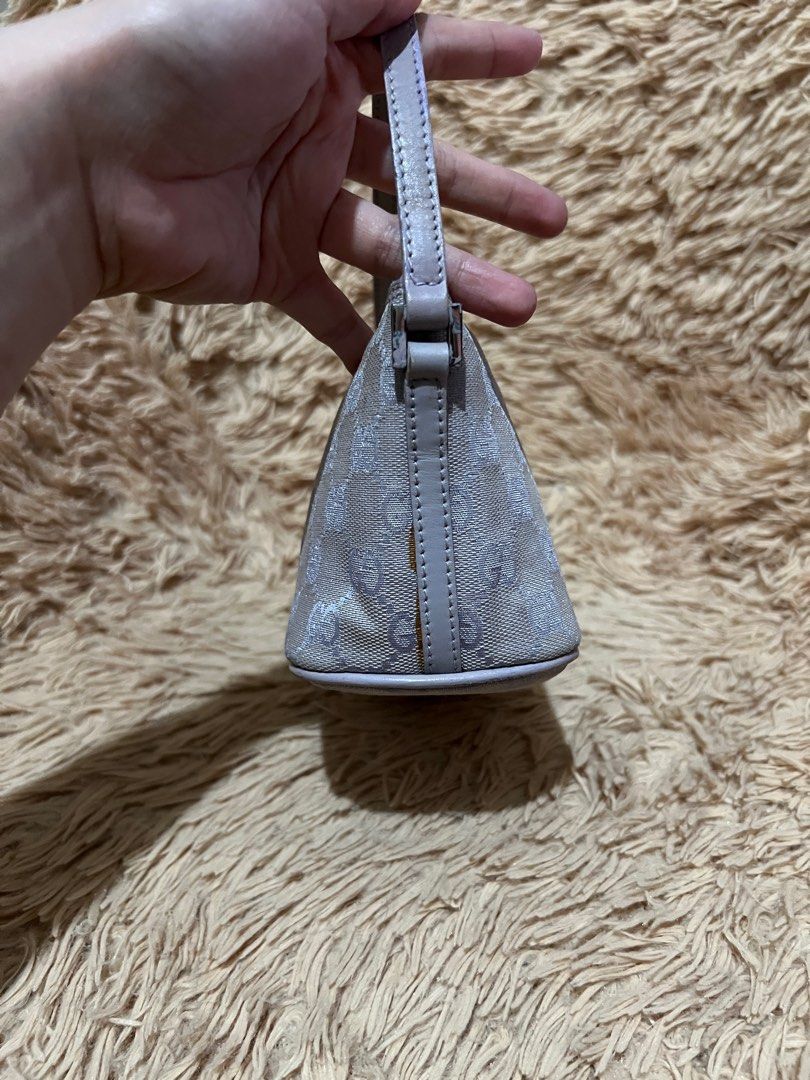 💯 RUSH Authentic Gucci Monogram Boat Pochette (Category: Luxury Bags & Wallets) located in Paranaque City. Submitted by authentic_mj (Listing ID 1262368082, Image 3). Description: 💯 RUSH Authentic Gucci Monogram Boat Pochette Bought in Japan Silver hardware Lining already recolored Minor dirt.