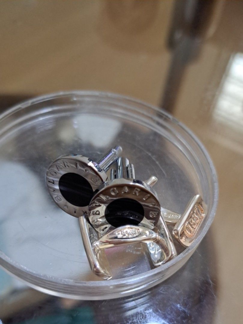 Assorted cufflinks (Category: Coats, Jackets and Outerwear) located in Singapore. Submitted by watermelonrabbit (Listing ID 1262389247, Image 2). Description: $70 for all 7 cufflinks. Comes with free basic postage. Top-up for smartpac. Containers used for illustration purposes. Not provided..