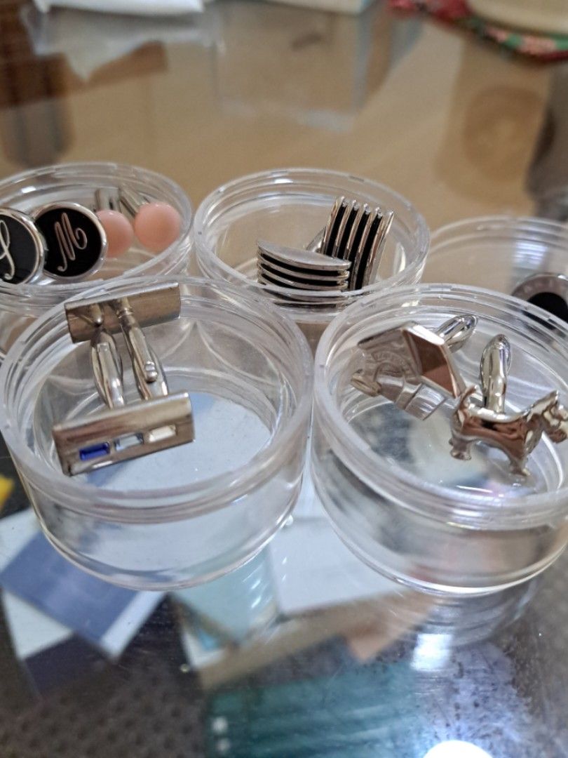 Assorted cufflinks (Category: Coats, Jackets and Outerwear) located in Singapore. Submitted by watermelonrabbit (Listing ID 1262389247, Image 1). Description: $70 for all 7 cufflinks. Comes with free basic postage. Top-up for smartpac. Containers used for illustration purposes. Not provided..