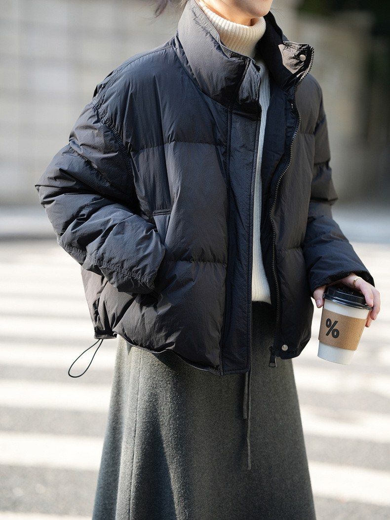 Puffer jacket with high collar outlet