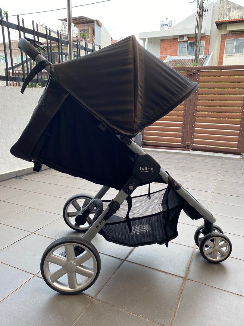 Used britax b agile stroller top
