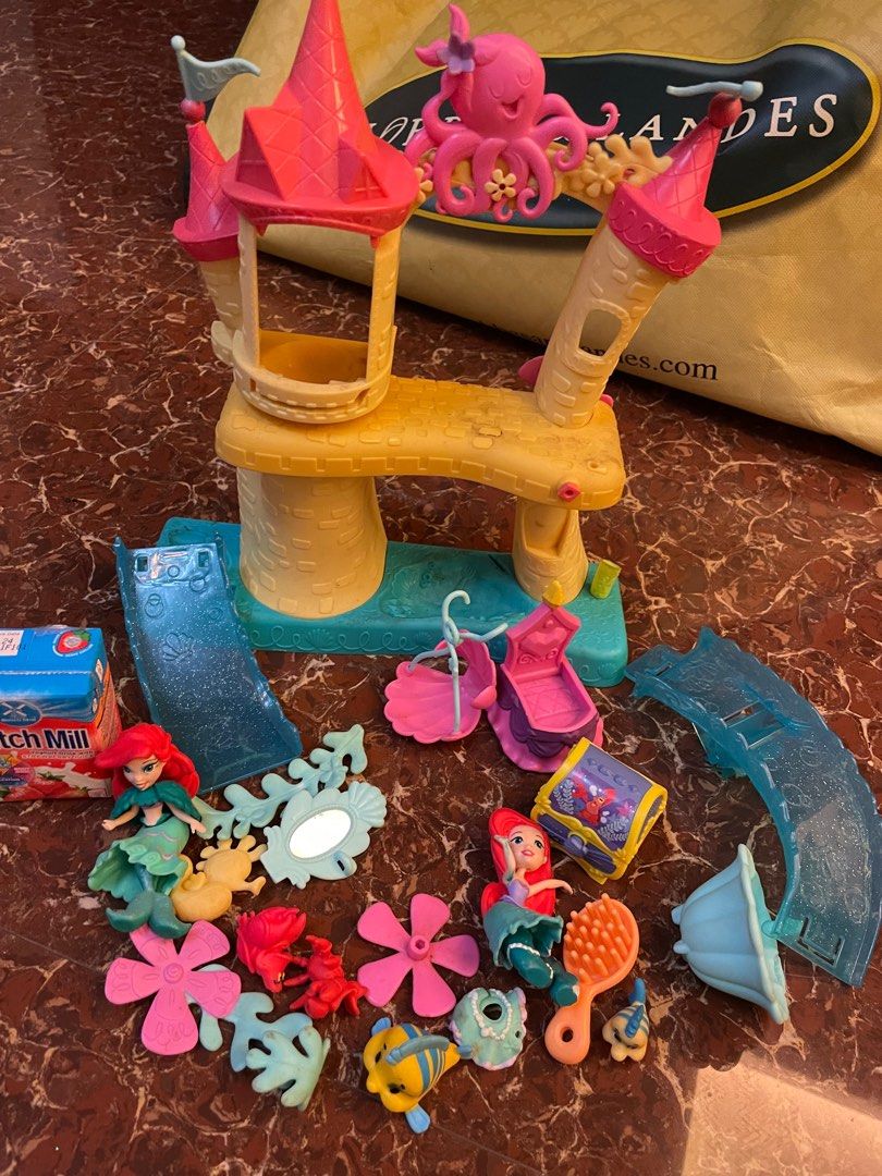 Little Mermaid play set (Category: Kids Toys) located in Mandaluyong City. Submitted by hazelandvivi (Listing ID 1262412237, Image 1). Description: Well loved Little mermaid play set. Condition is 8/10. Some missing parts but cones with free 2 Ariels and Flounder.