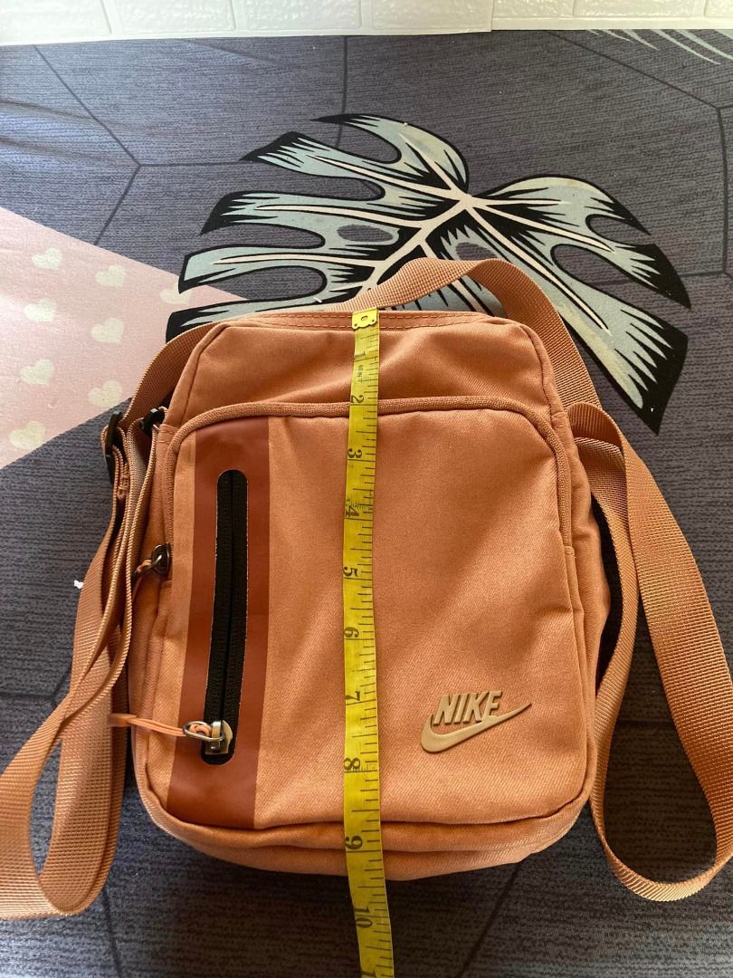 Nike sling bag rose gold discount