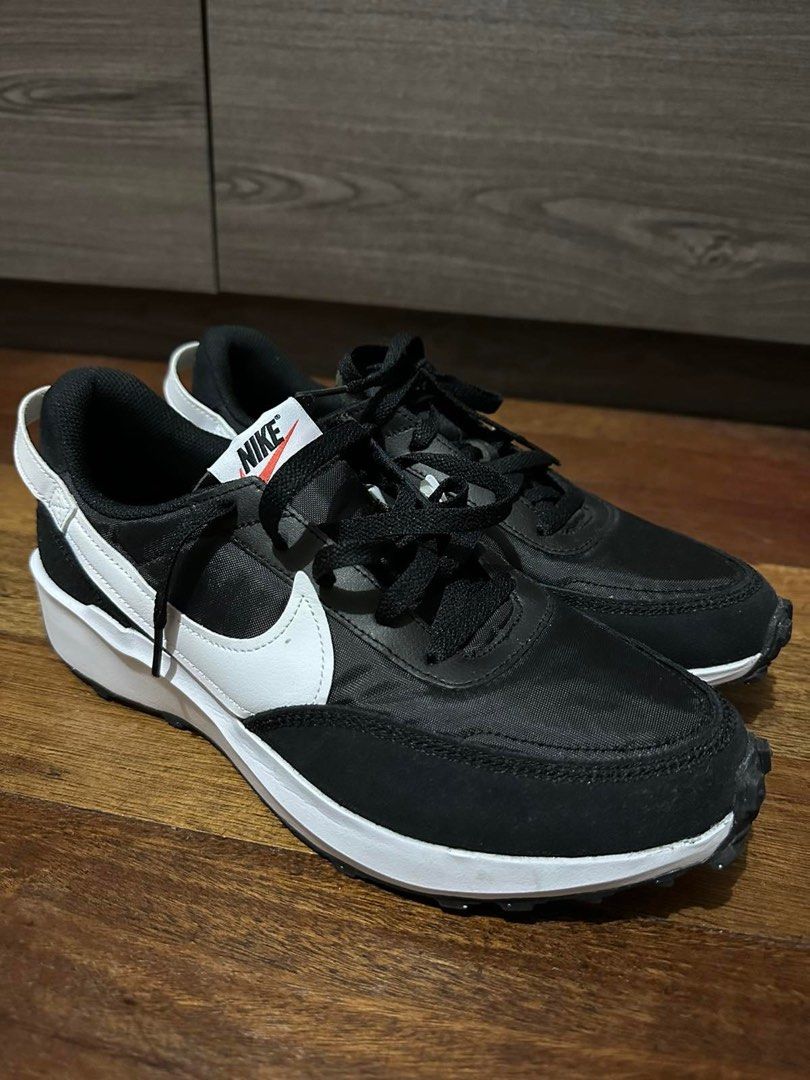 Nike waffle Debut (Category: Sneakers) located in Paranaque City. Submitted by helloasher (Listing ID 1262492623, Image 1). Description: Brand new Size 9 Black and white .