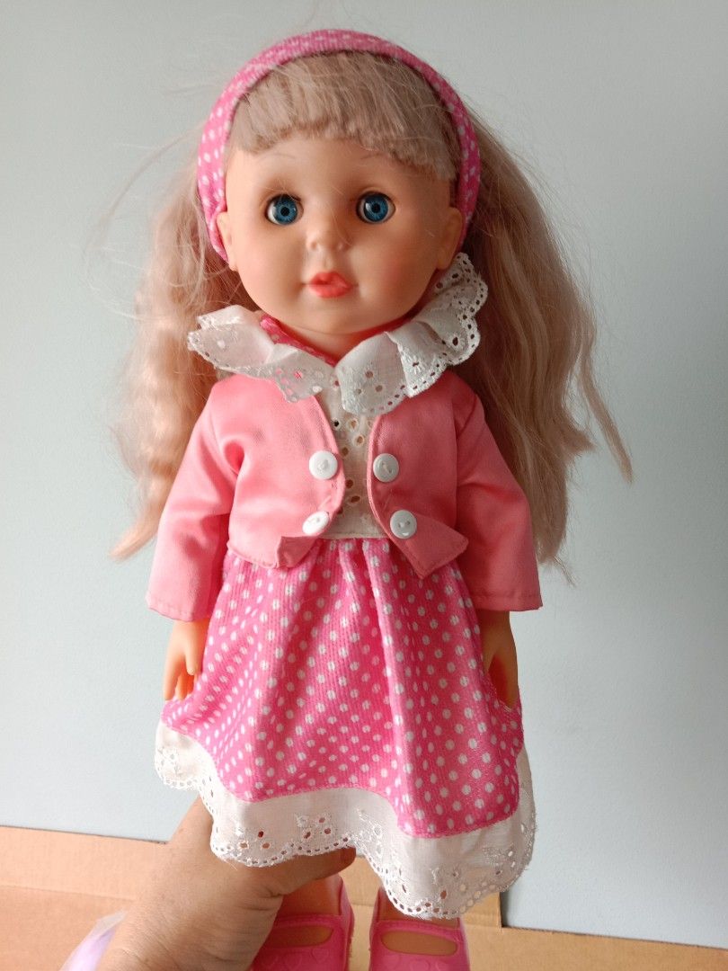 Doll walks clearance talks closes eyes