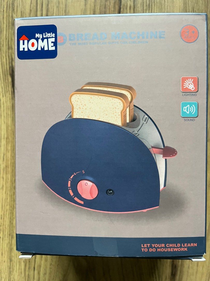 Bread Machine (Category: Infant Playtime) located in Taiping. Submitted by ronb20 (Listing ID 1262549955, Image 1). Description: Toaster have light and sound .