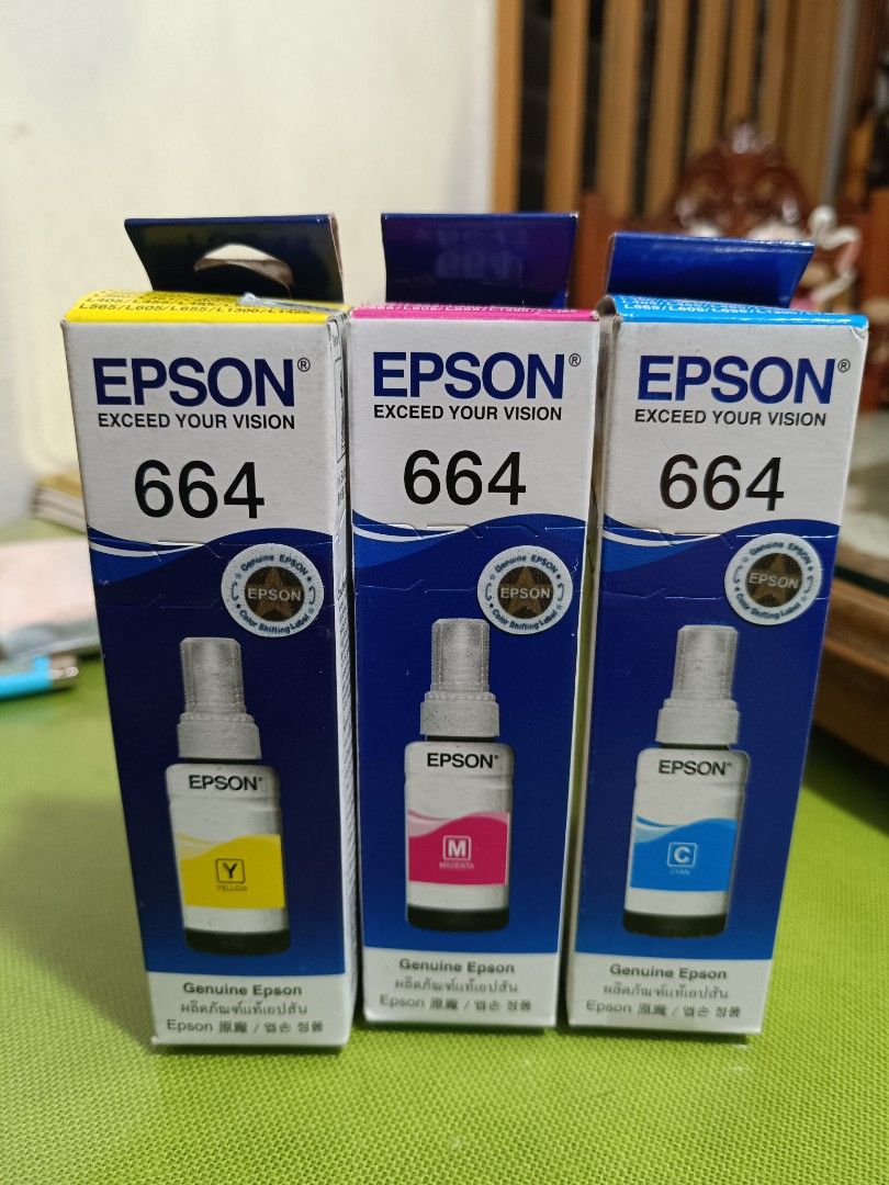 Epson 664 ink Take ALL (Category: Printers, Scanners & Copiers) located in Camalaniugan. Submitted by eluuughhhh (Listing ID 1262645899, Image 2). Description: Selling these Epson Inks for take all only All Sealed PAYO GCASH J&T RFS: Mali yung nakuha ng kapatid ko lol.