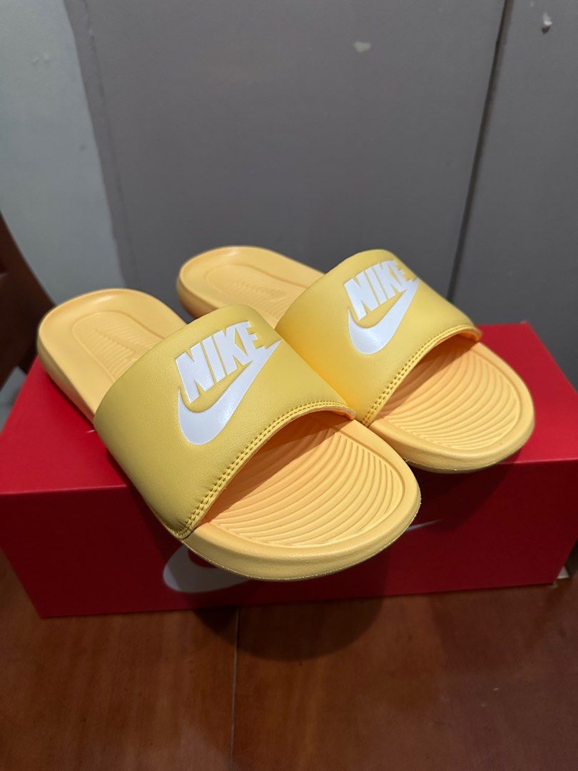 Pink and yellow nike slides store