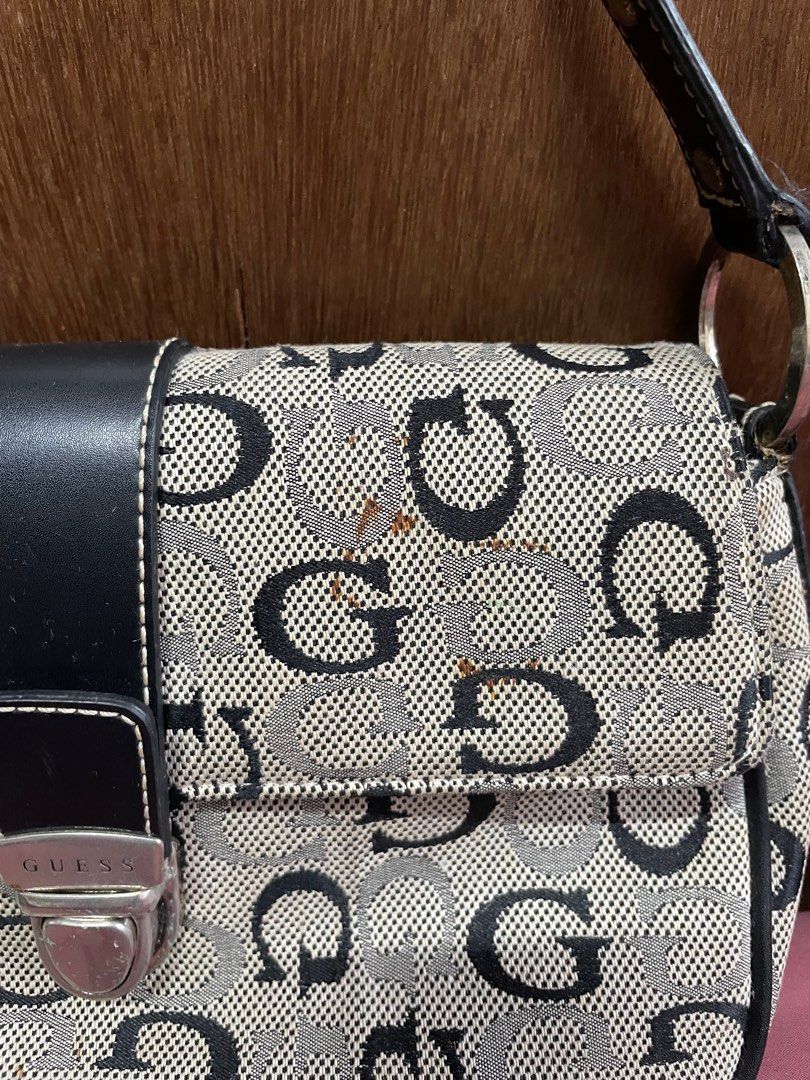 Guess Bag (Category: Shoulder Bags) located in Quezon City. Submitted by elleshops (Listing ID 1262544318, Image 3). Description: Original, money back guarantee if proven fake This is well used so there are flaws.