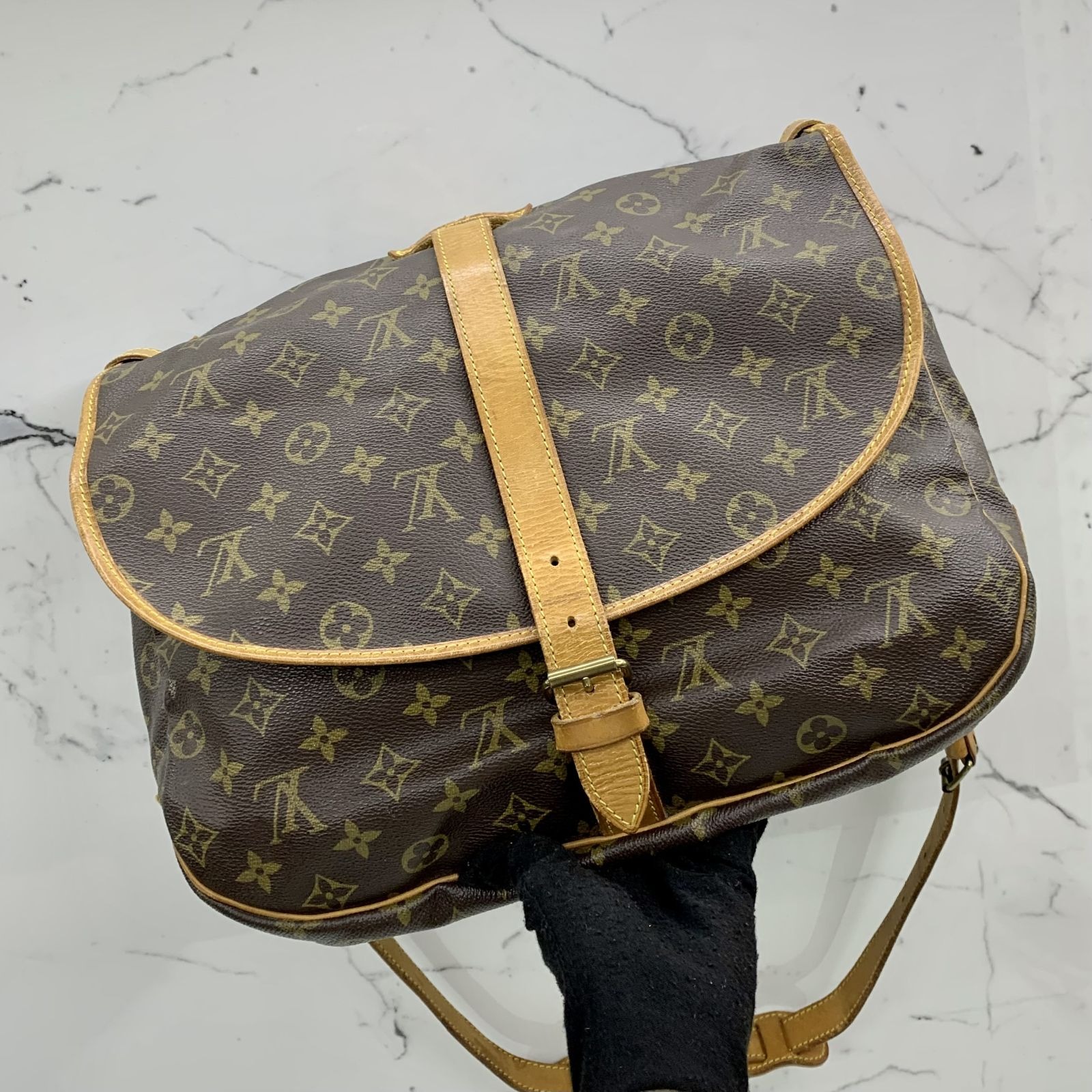 Louis Vuitton Saumur large model shoulder bag in brown monogram
