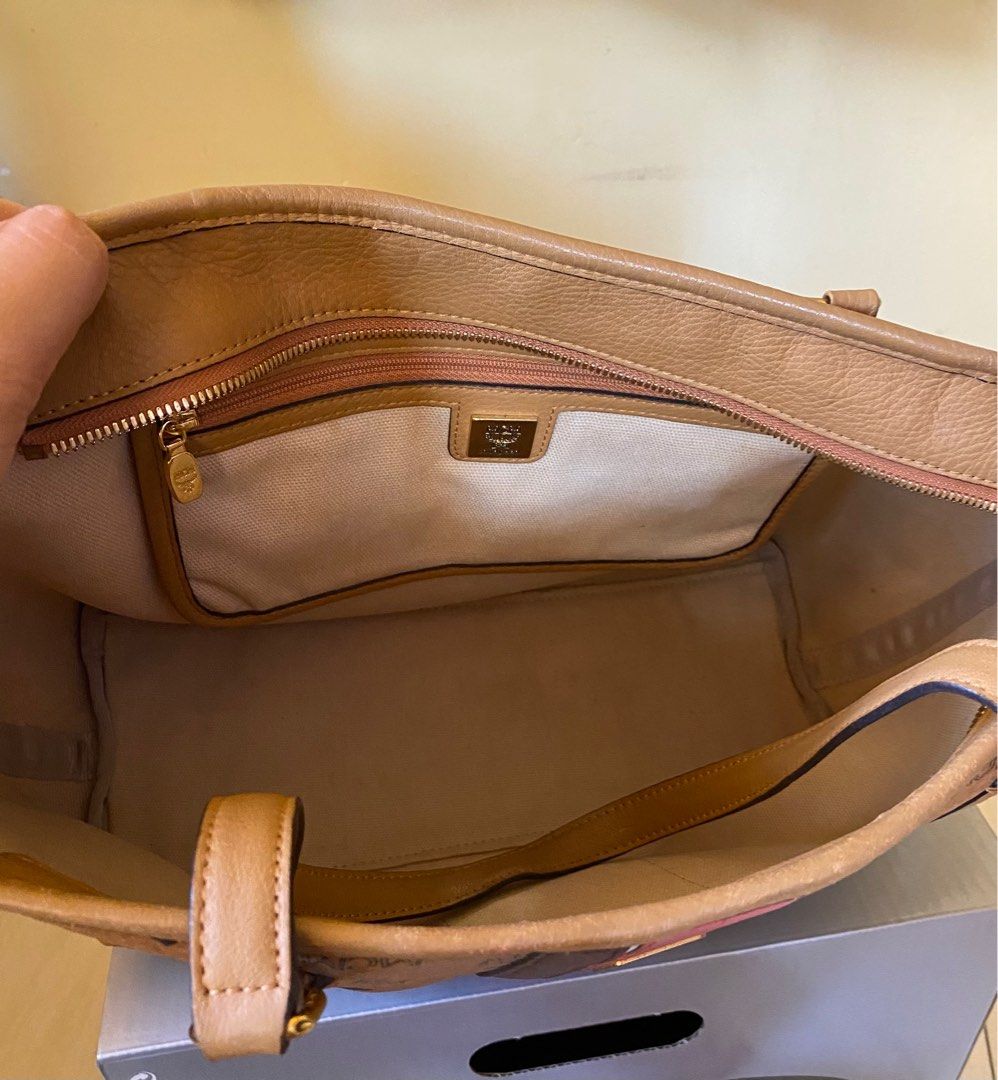 MCM Cognac (authentic) (Category: Luxury Bags & Wallets) located in Manila. Submitted by fayepalana (Listing ID 1262562413, Image 3). Description: RFS: Decluttering Preloved authentic McM bag Slightly used See attached photos for actual condition of the bag MOP: Gcash, Paymaya, BPI, BDO .