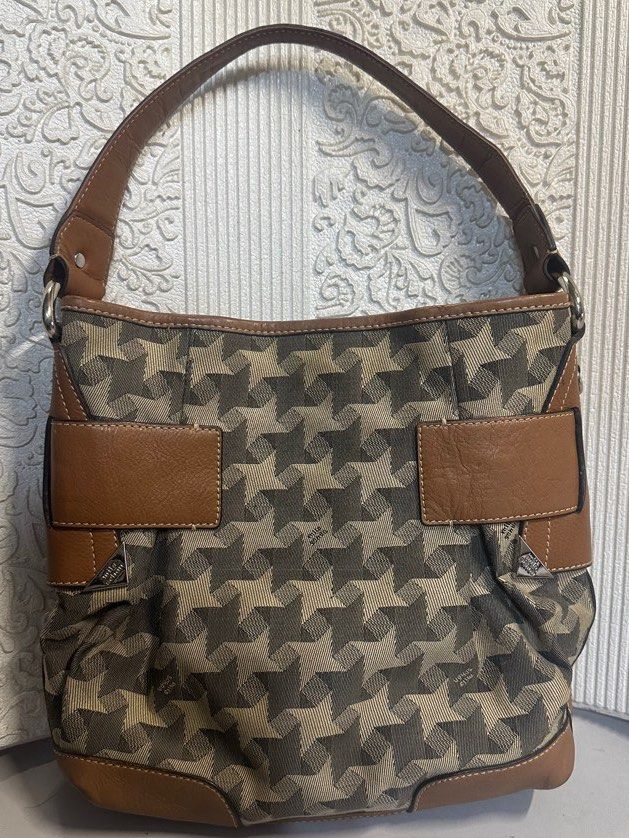 Mila Schon Bucket shoulder bag (Category: Luxury Bags & Wallets) located in Manila. Submitted by shopaholic_gurl (Listing ID 1262499472, Image 2). Description: Like new item Canvas printed bag Internal pockets Bucket style Silver hardware Sold as is.