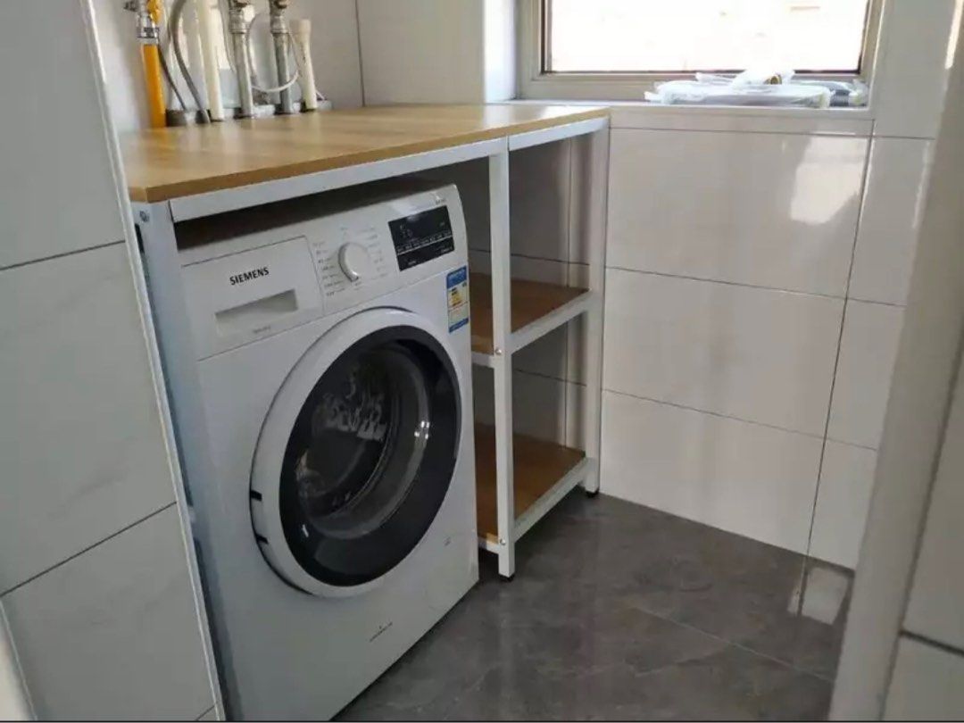 Multi-functional Storage Rack (Category: Shelves, Cabinets & Racks) located in Kuala Lumpur. Submitted by simyeel (Listing ID 1262583971, Image 2). Description: The upper layer can put drying / washing machine (stackable), oven, microwave, or simply additional space for stuffs Colour and Material: White steel frame with walnut countertop Material: Thickened carbon steel square tube, high stability Application: Kitchen, yard, balcony, outdoor Inst