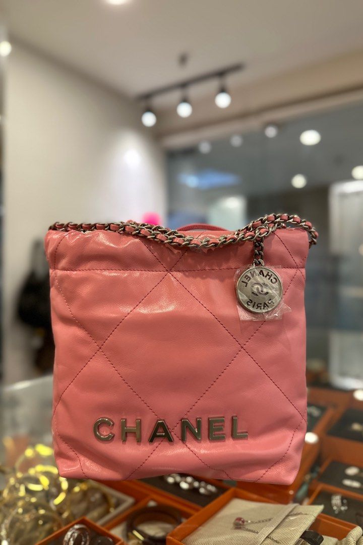 Fresh from boutique ‼️ Chanel mini 22 bag coral pink, Luxury, Bags &  Wallets on Carousell