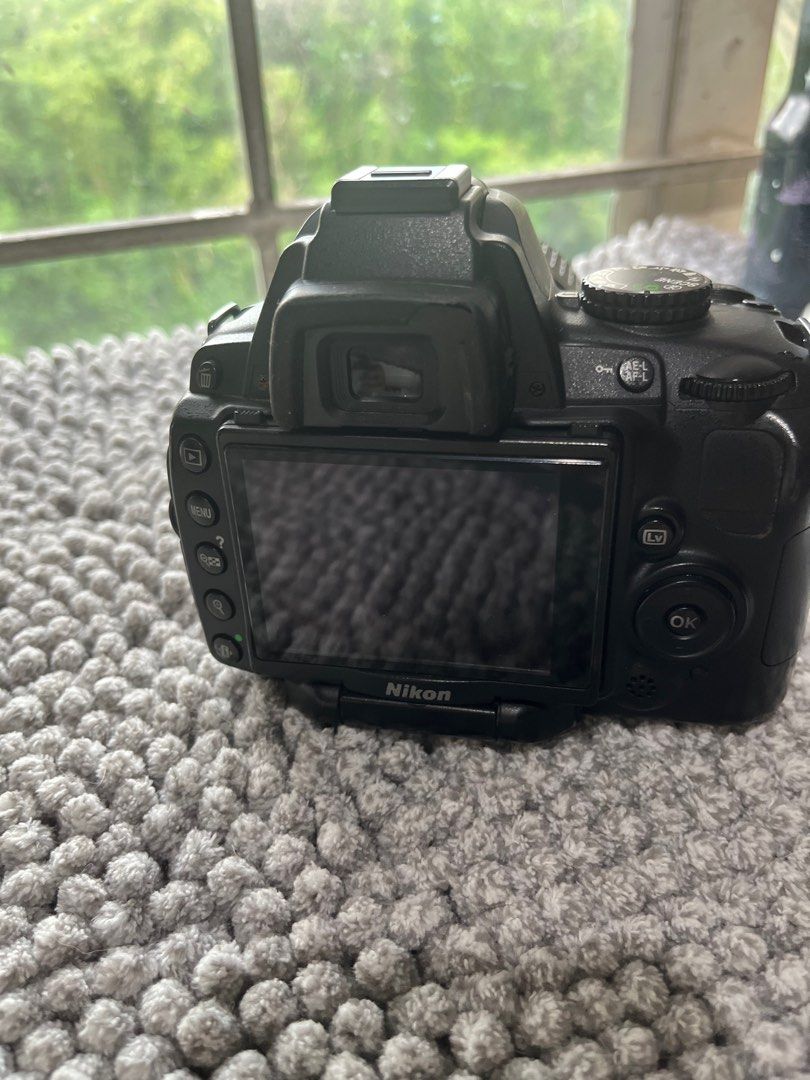 PRELOVED NIKON D5000 with Manfrotto tripod (Category: Cameras) located in Makati City. Submitted by owlretail (Listing ID 1262544532, Image 3). Description: ❗️PLEASE READ❗️ PRELOVED NIKON D5000 with MANFROTTO COMPACT SERIES TRIPOD Selling as a set. Nikon D5000 has minor flaw on Nikkor 18-55 lens. Please see second photo. This can be fixed either at Nikon center or on your own. Does not impact camera or lens condition or ability to take photos. Ni