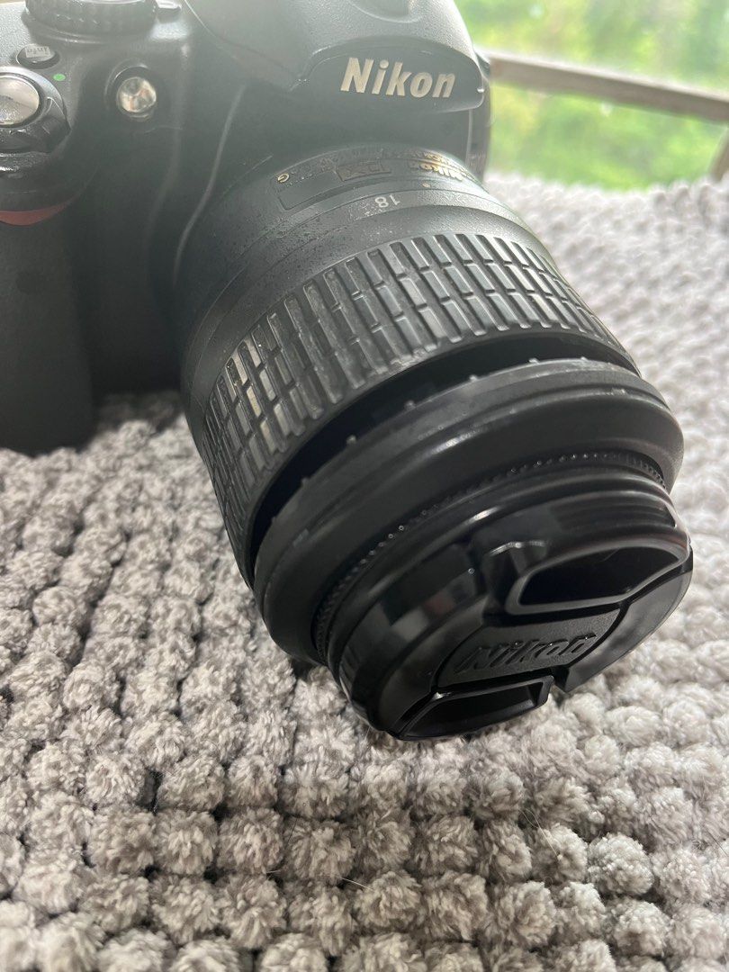 PRELOVED NIKON D5000 with Manfrotto tripod (Category: Cameras) located in Makati City. Submitted by owlretail (Listing ID 1262544532, Image 2). Description: ❗️PLEASE READ❗️ PRELOVED NIKON D5000 with MANFROTTO COMPACT SERIES TRIPOD Selling as a set. Nikon D5000 has minor flaw on Nikkor 18-55 lens. Please see second photo. This can be fixed either at Nikon center or on your own. Does not impact camera or lens condition or ability to take photos. Ni