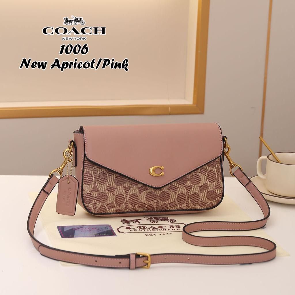 Coach pink Signature Wyn Cross-Body Bag