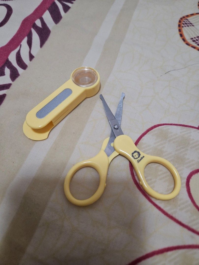 https://media.karousell.com/media/photos/products/2023/10/28/simba_baby_scissors_with_nail__1698510771_eb5d4b72_progressive.jpg