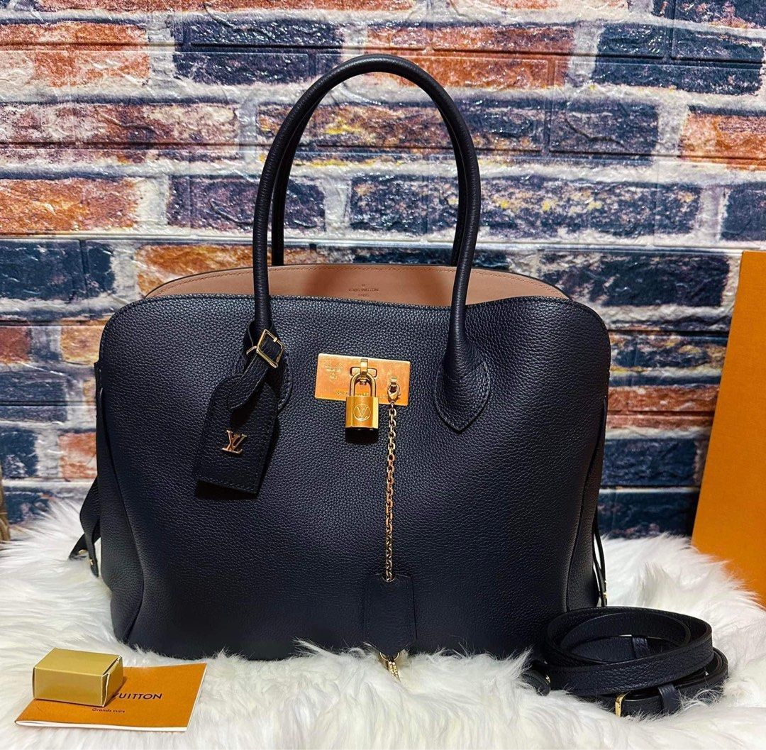 Louis Vuitton Milla Clutch MM, Luxury, Bags & Wallets on Carousell