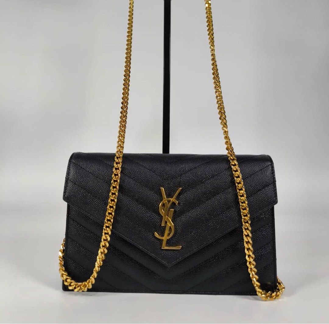 YSL woc black with gold hardware, Luxury, Bags & Wallets on Carousell