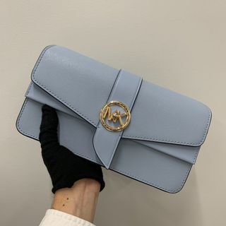 Michael Kors Mini Pochette Crossbody Bag, Luxury, Bags & Wallets on  Carousell