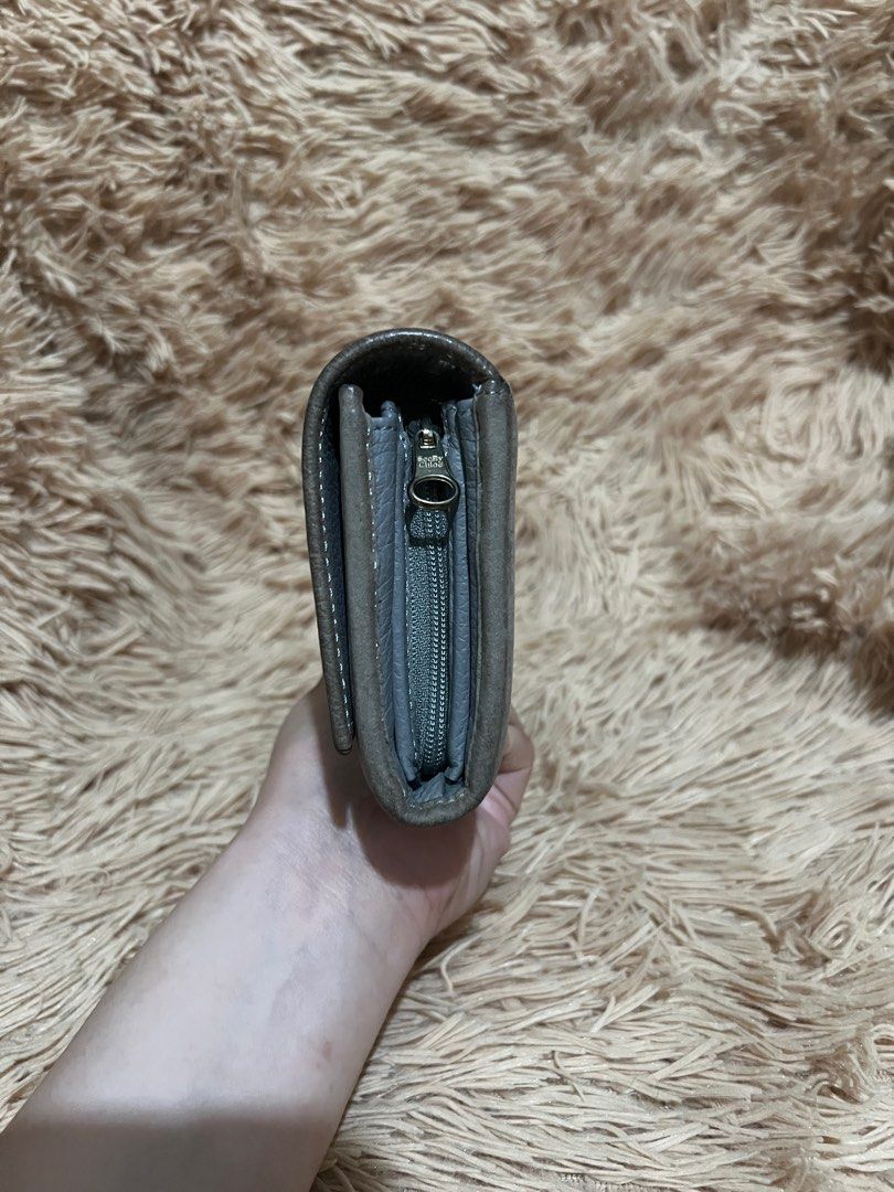 💯 Authentic See By Chloe Long Wallet (Category: Luxury Bags & Wallets) located in Paranaque City. Submitted by authentic_mj (Listing ID 1262825568, Image 3). Description: 💯 Authentic See By Chloe Long Wallet Preloved Authentic from Japan Issue: Dirt and sign of usage.