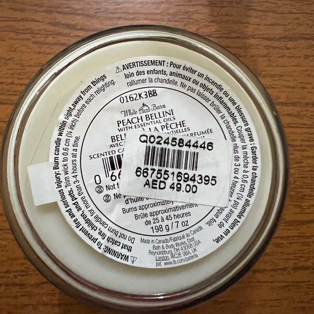 Bath & Body Works Single Wick Candle Peach Bellini (Category: Home Fragrance) located in Manila. Submitted by goingoncegoingtwice (Listing ID 1262757619, Image 2). Description: Scent Name: Peach Bellini Degree of usage as indicated in pictures. Bought for: 49aed or 800 pesos.