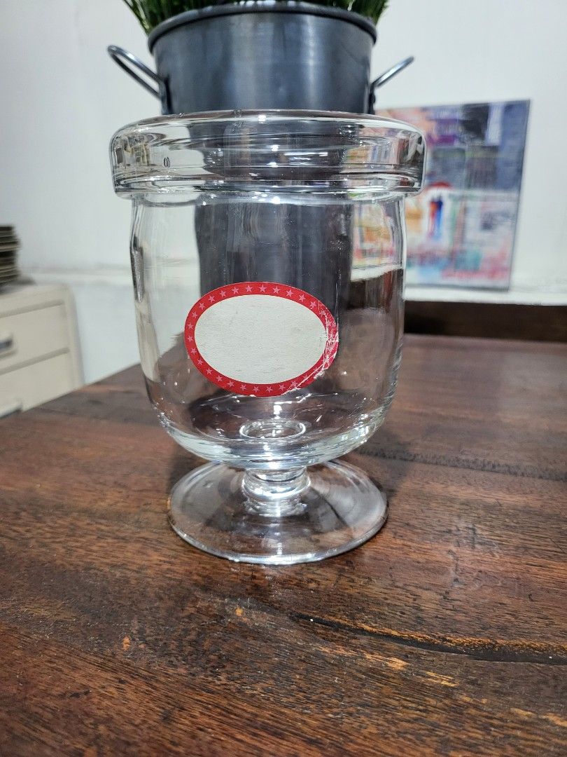 Glass Candy jar (Category: Food Organization & Storage) located in Makati City. Submitted by thedeclutteringabuela (Listing ID 1262828220, Image 2). Description: glass candy jar. 4 in , height 6in.