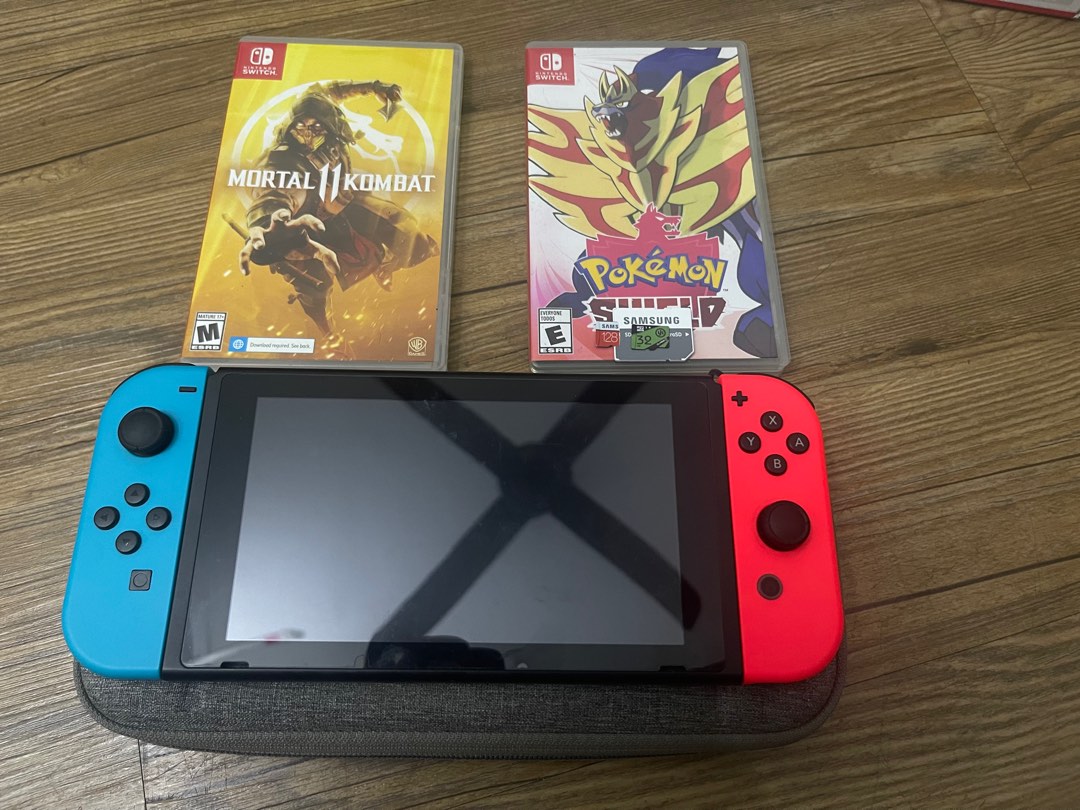 Nintendo Switch V2 and 2 game. Video Gaming Video Game Consoles