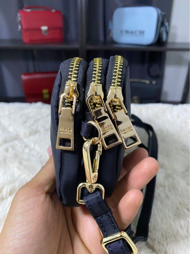 Prada black and online gold crossbody