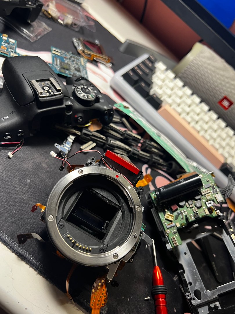 Canon camera repair hot sale
