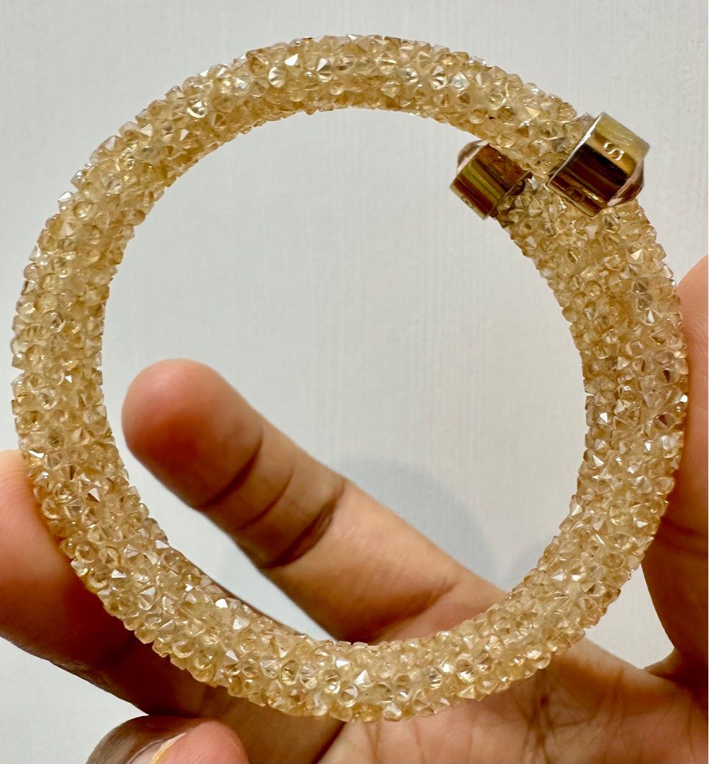 Swarovski Crystaldust Wrap Bracelet ($89) ❤ liked on Polyvore featuring  jewelry, bracelets, gold, … | Swarovski bangle bracelet, Swarovski  crystaldust, Gold fashion