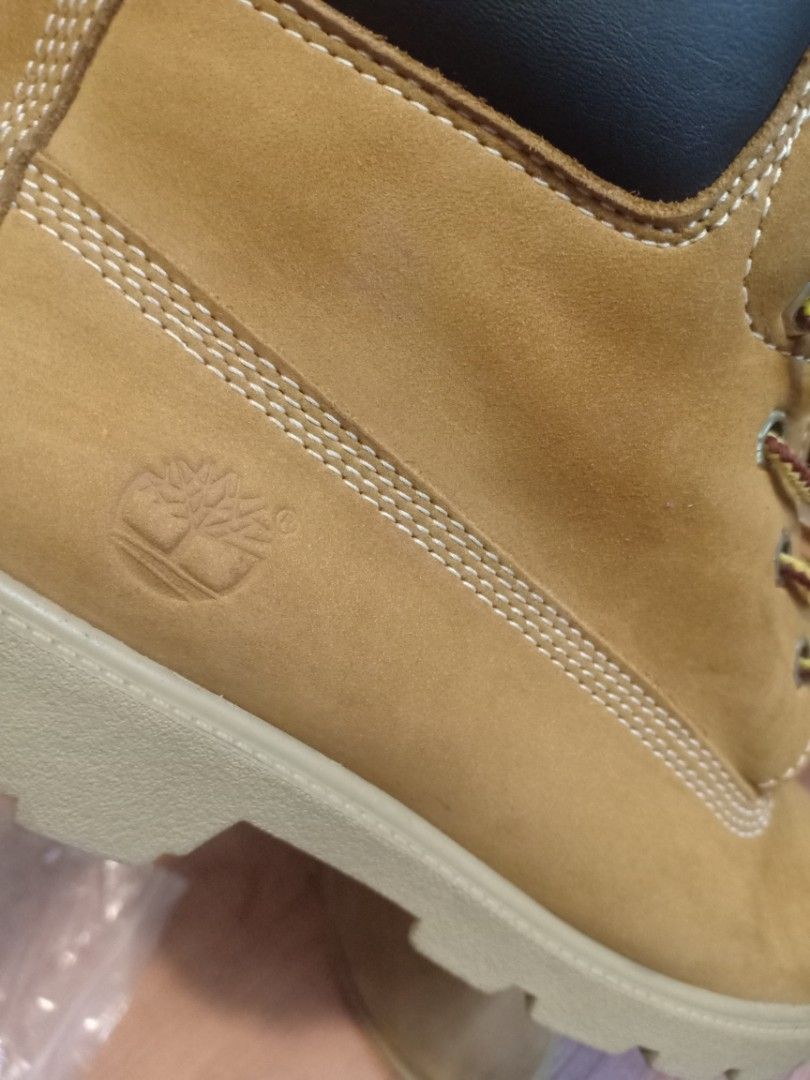Timbs with tag on sale