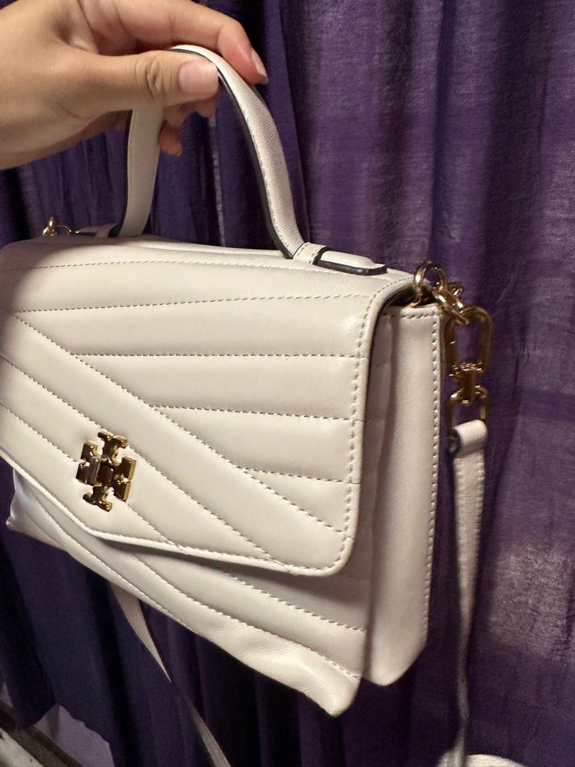 Tory Burch Kira Chevron Top Handle (Category: Luxury Bags & Wallets) located in Quezon City. Submitted by cesca.ribay-75744 (Listing ID 1262702734, Image 2). Description: Hello! Selling this low bought from baggedph2020 on Ig with dust bag RFS: Decluttering and gift from ex suitor.
