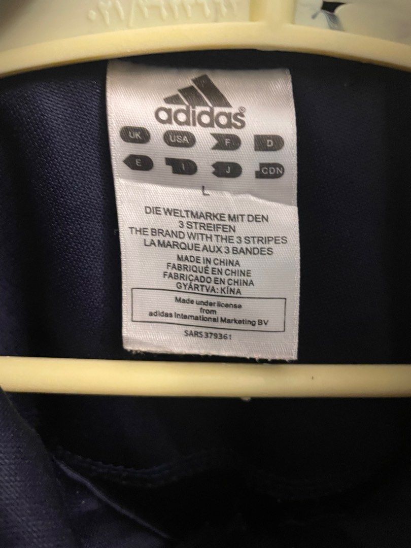 Adidas tracksuits store china usa