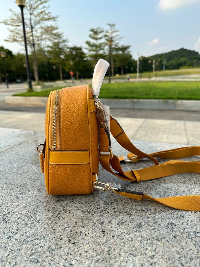 Michael kors crossbody on sale backpack