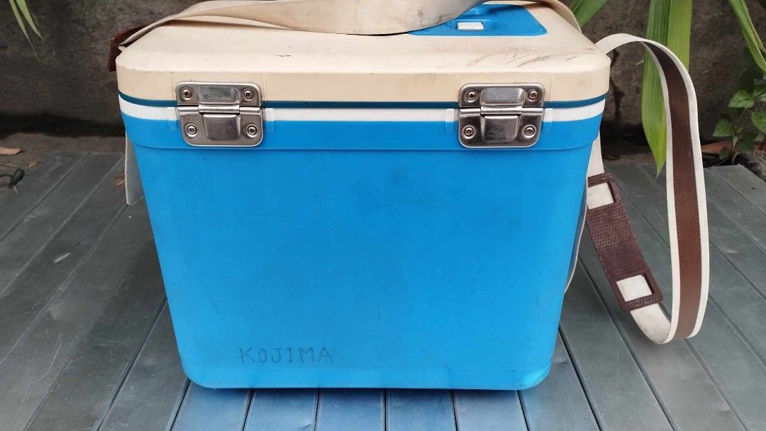 Fishing cooler outdoor camping swimming (Category: Food Organization & Storage) located in Manila. Submitted by benjie.benjie3 (Listing ID 1258210949, Image 3). Description: Fishing cooler outdoor camping swimming Brand= marine coolers 12 Model- fishing cooler Cooler size H= 11 1/4 nches L= 14 Inches W= 9 Inches Color = blue Material = hard plastic and stainless Made in Japan 2nd hand with scratch No warranty If there's Damage or Issues they can 