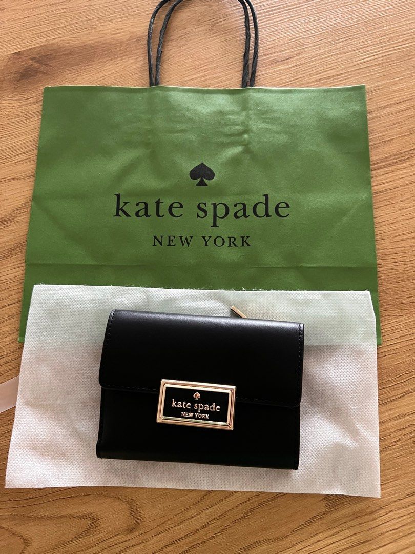 Kate Spade Regan Medium Flap Wallet (Category: Luxury Bags & Wallets) located in Makati City. Submitted by welllovedhandmedowns (Listing ID 1258062651, Image 1). Description: Kate Spade Regan Medium Flap Wallet in Black No box but comes with dust bag and Kate Spade paperbag as shown in photo Bought at Rinku Premium Outlets in Osaka Perfect gift this holiday season!.