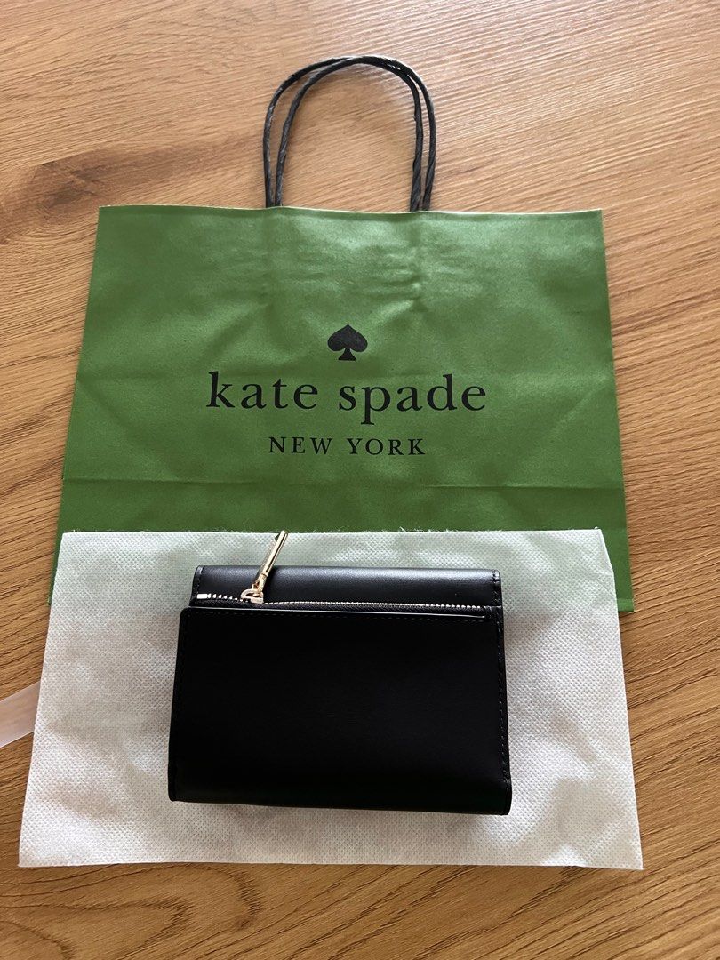 Kate Spade Regan Medium Flap Wallet (Category: Luxury Bags & Wallets) located in Makati City. Submitted by welllovedhandmedowns (Listing ID 1258062651, Image 3). Description: Kate Spade Regan Medium Flap Wallet in Black No box but comes with dust bag and Kate Spade paperbag as shown in photo Bought at Rinku Premium Outlets in Osaka Perfect gift this holiday season!.