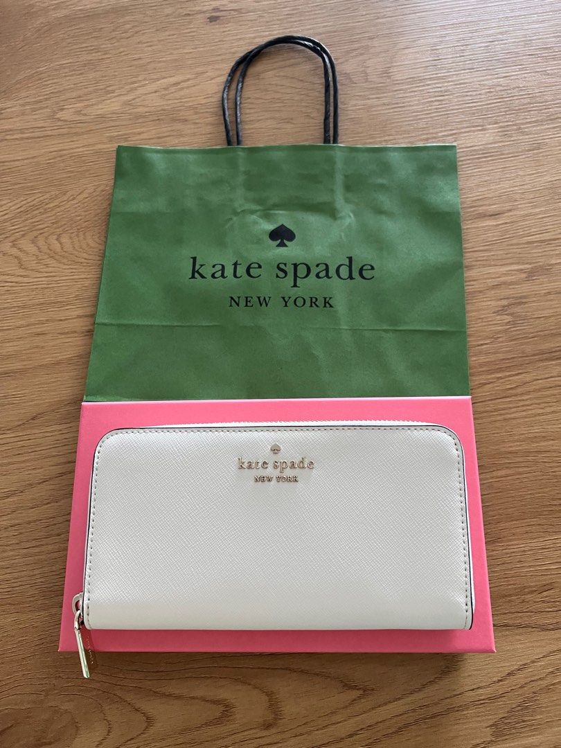 Kate Spade Stacy Large Continental Wallet (Category: Luxury Bags & Wallets) located in Makati City. Submitted by welllovedhandmedowns (Listing ID 1258060866, Image 1). Description: Kate Spade Stacy Large Continental Wallet In white With box and Kate Spade paperbag as per photo Bought in Rinko Premium Outlet in Osaka Perfect gift this holiday season! Free delivery if within Makati.