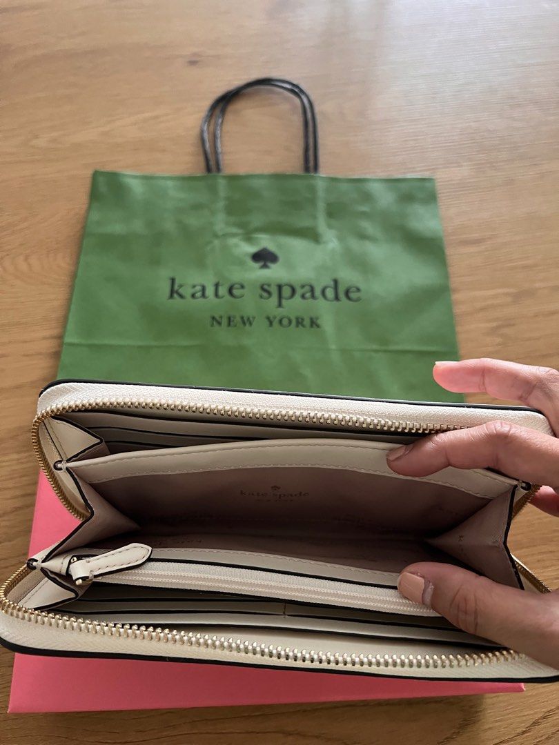 Kate Spade Stacy Large Continental Wallet (Category: Luxury Bags & Wallets) located in Makati City. Submitted by welllovedhandmedowns (Listing ID 1258060866, Image 2). Description: Kate Spade Stacy Large Continental Wallet In white With box and Kate Spade paperbag as per photo Bought in Rinko Premium Outlet in Osaka Perfect gift this holiday season! Free delivery if within Makati.