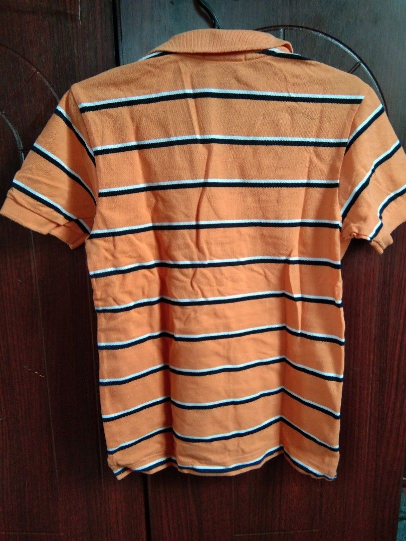Kids polo shirt (Category: Babies & Kids Fashion) located in Santa Maria. Submitted by pabilip0 (Listing ID 1258082487, Image 2). Description: kids polo shirt Bossini Brand Large on tag (fits 6-8 years old) lightly used.