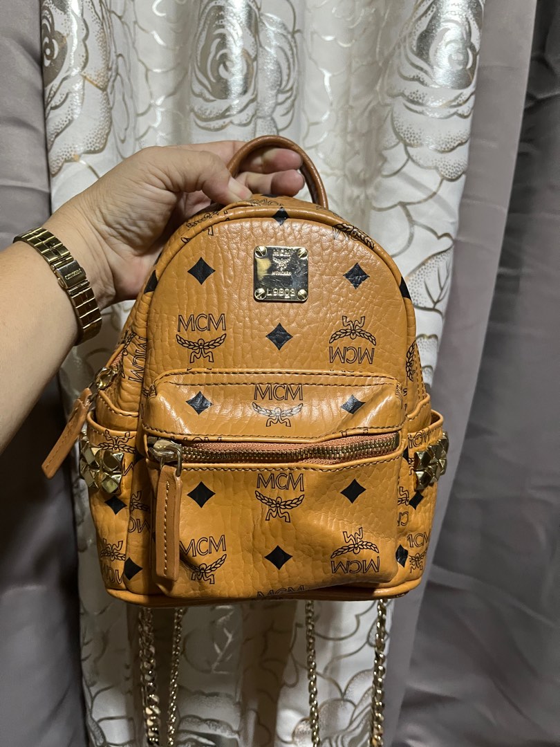 Legit MCM backpack turnable screws, Luxury, Bags & Wallets on Carousell