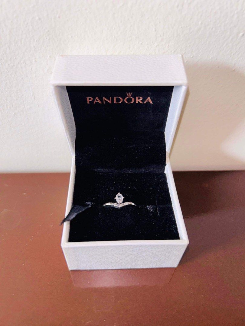 Pandora Classic Wishbone Ring (Original) (Category: Rings) located in Samal. Submitted by everything_z (Listing ID 1258146759, Image 3). Description: Selling my authentic pandora classic wish bone ring size 6 for only ₱1,300 (can go lower) with free polishing cloth. RFS: Wrong size.