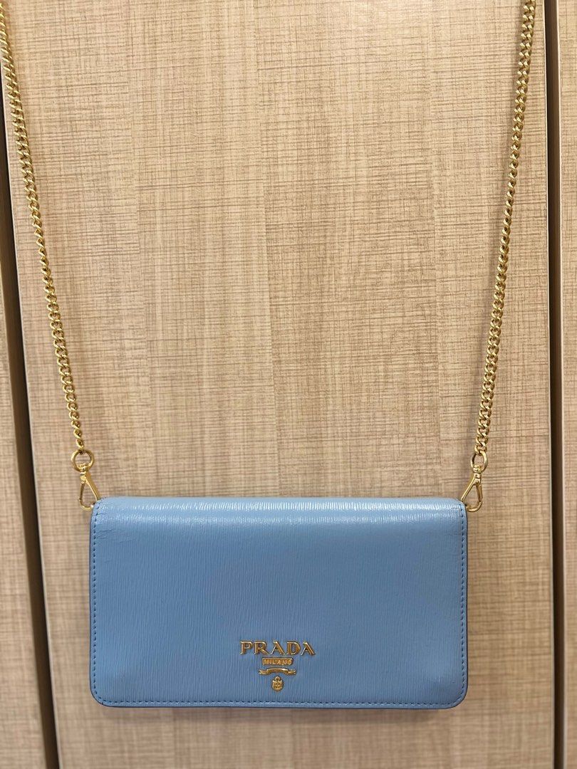 Prada Wallet on Chain Light Blue (Category: Luxury Bags & Wallets) located in Davao. Submitted by prelovedbymevs (Listing ID 1257260307, Image 2). Description: Comes dustbag but lost the authenticity card. Guaranteed authentic. With extra metal chain as freebie. With visible but still in excellent condition. Message for more pics. 🩵Lay- away is accepted. Additional photos available upon request..